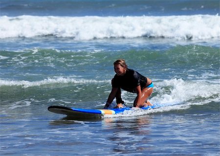 simsearch:400-07212727,k - adult woman - the surfer in ocean. Bali. Indonesia Foto de stock - Super Valor sin royalties y Suscripción, Código: 400-04709049