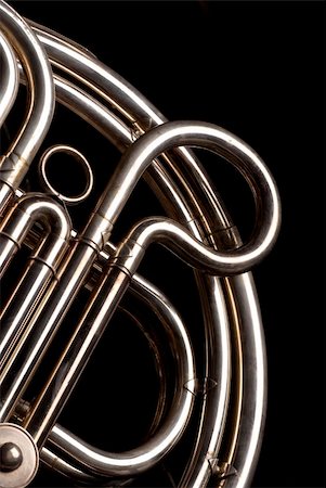 Detail of the coiled pipes of a French horn Foto de stock - Super Valor sin royalties y Suscripción, Código: 400-04709067