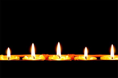 simsearch:640-01364849,k - row of candles on black background Stock Photo - Budget Royalty-Free & Subscription, Code: 400-04709086