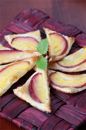 simsearch:400-04822787,k - Delicious puff pastry triangles with fresh nectarines Stock Photo - Budget Royalty-Free & Subscription, Code: 400-04709497