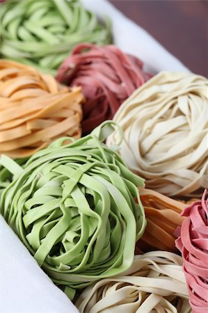 simsearch:673-02140855,k - Assortment of colorful tagliatelle pasta dyed with natural dye from carrots, potatoes, spinach and beetroot Stock Photo - Budget Royalty-Free & Subscription, Code: 400-04709504