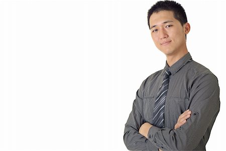 simsearch:400-04255435,k - Young businessman of Asian with friendly expression on white background. Foto de stock - Super Valor sin royalties y Suscripción, Código: 400-04709836