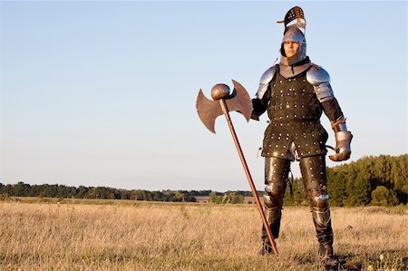 rüstung - Medieval knight in the field with an axe Stockbilder - Microstock & Abonnement, Bildnummer: 400-04700080