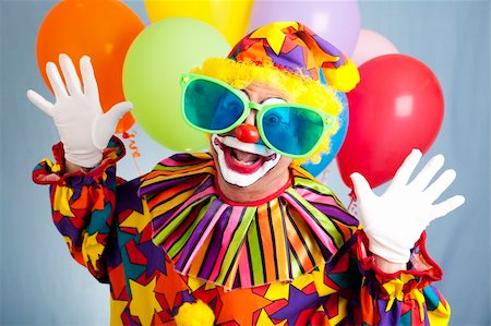 simsearch:400-04408991,k - Funny birthday clown in hilarious oversized sunglasses. Foto de stock - Super Valor sin royalties y Suscripción, Código: 400-04700189