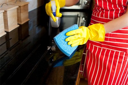 simsearch:649-06113766,k - Close-up of a young woman doing housework in the kitchen Foto de stock - Super Valor sin royalties y Suscripción, Código: 400-04700548