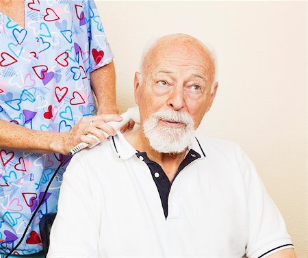 elderly physiotherapy - Senior man at chiropractor receives ultrasound to help with neck pain. Stock Photo - Budget Royalty-Free & Subscription, Code: 400-04700629