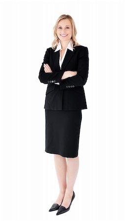 simsearch:400-05242665,k - A confident businesswoman with folded arms against white background Foto de stock - Super Valor sin royalties y Suscripción, Código: 400-04702349