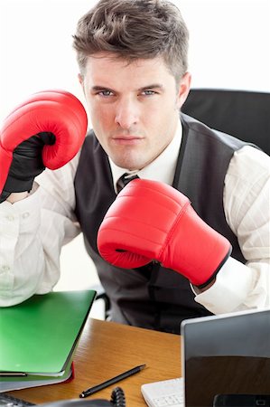 simsearch:400-04333650,k - Angry businessman wearing boxing gloves in the office Stock Photo - Budget Royalty-Free & Subscription, Code: 400-04702363