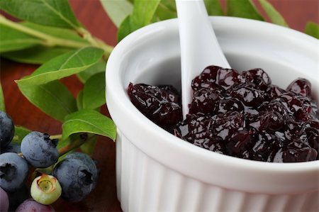 Blueberry jam in a white bowl and fresh blueberries Stock Photo - Budget Royalty-Free & Subscription, Code: 400-04702490