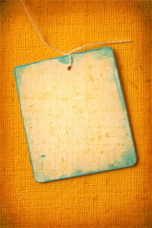 simsearch:400-07470440,k - Close up of handmade paper tag for background Stock Photo - Budget Royalty-Free & Subscription, Code: 400-04702659