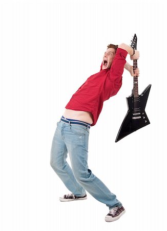 simsearch:400-04524241,k - studio shot pictures on isolated background of a angry man holding a guitar and trying to brak it Photographie de stock - Aubaine LD & Abonnement, Code: 400-04702948