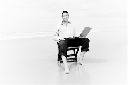 business man sitting on a chair on the beach with laptop Stock Photo - Budget Royalty-Free & Subscription, Code: 400-04703655