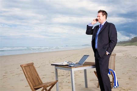 Business man with office on the beach Stock Photo - Budget Royalty-Free & Subscription, Code: 400-04703652