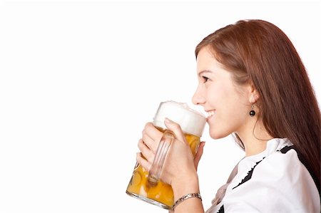 simsearch:400-07087495,k - Beautiful woman in dirndl cloth holds Oktoberfest beer stein.Isolated on white background. Stock Photo - Budget Royalty-Free & Subscription, Code: 400-04703793