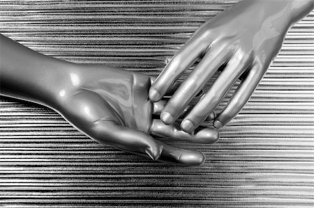 simsearch:400-08652593,k - hands together futuristic robot silver steel over gray background Photographie de stock - Aubaine LD & Abonnement, Code: 400-04703819