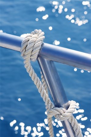 railing steel - marine knot detail on stainless steel boat railing banister Stock Photo - Budget Royalty-Free & Subscription, Code: 400-04703827