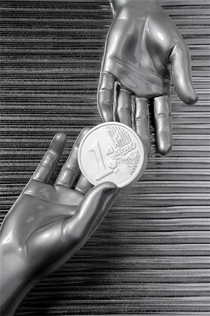 simsearch:695-05780265,k - silver euro coins in futuristic robot gray metallic hands bank metaphor Photographie de stock - Aubaine LD & Abonnement, Code: 400-04703820