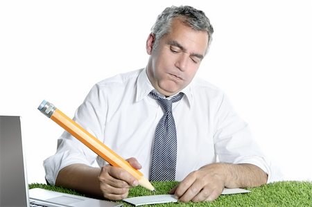 simsearch:400-04204942,k - businessman senior sign bank check funny humor gesture big pencil on green grass Stock Photo - Budget Royalty-Free & Subscription, Code: 400-04703894