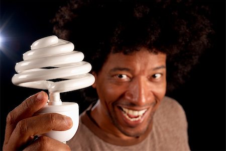 Changing to energy saving bulbs, a brilliant idea Stock Photo - Budget Royalty-Free & Subscription, Code: 400-04715028