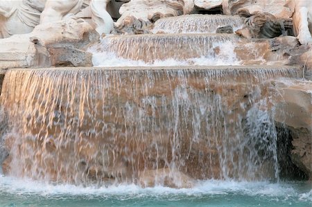 fontäne - Detail of Trevi fountain (Fontana di Trevi) in Rome with water falling in the maain basin Stock Photo - Budget Royalty-Free & Subscription, Code: 400-04715484