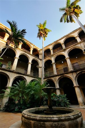 facade of colonial city - Cuban colonial house with interior court yard and fountain in Old Havana Stock Photo - Budget Royalty-Free & Subscription, Code: 400-04715812