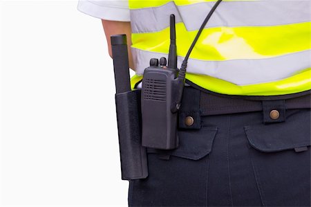 fondina - Closeup photograph of a security officer belt. Fotografie stock - Microstock e Abbonamento, Codice: 400-04716233
