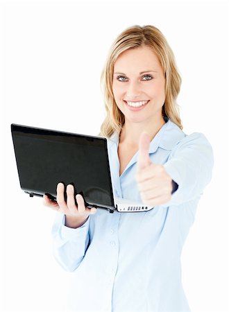 Jolly young businesswoman holding a laptop with thumb up against white background Stock Photo - Budget Royalty-Free & Subscription, Code: 400-04716567