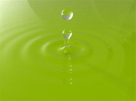 High quality 3D render of a water drop bouncing back creating ripples Stock Photo - Budget Royalty-Free & Subscription, Code: 400-04716655