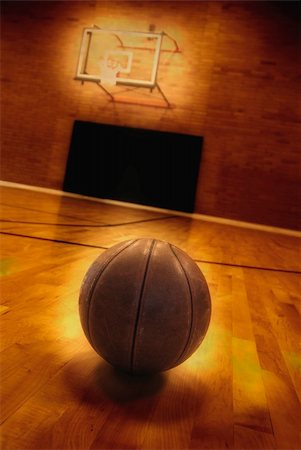 Basketball on floor of empty basketball court Stock Photo - Budget Royalty-Free & Subscription, Code: 400-04716709