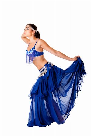 dancing indian girls images - Beautiful Arabic belly dancer harem woman in blue with silver dress and head jewelry with gem dancing holding skirt, isolated. Stock Photo - Budget Royalty-Free & Subscription, Code: 400-04716792