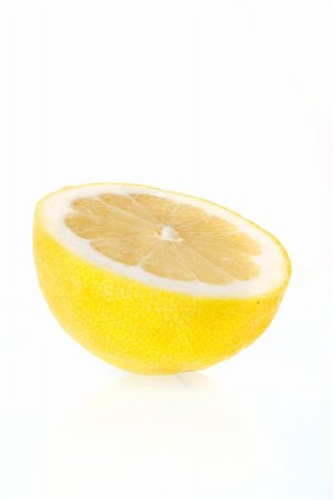 simsearch:400-08814206,k - Lemon isolated on white background. Photographie de stock - Aubaine LD & Abonnement, Code: 400-04717383