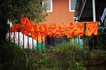 simsearch:400-04729403,k - Orange soccer uniforms drying on the line in Costa Rica Photographie de stock - Aubaine LD & Abonnement, Code: 400-04717539