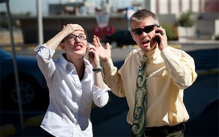 directional unexpected - Couple is upset with people on the opposite end of the line. Stock Photo - Budget Royalty-Free & Subscription, Code: 400-04717564