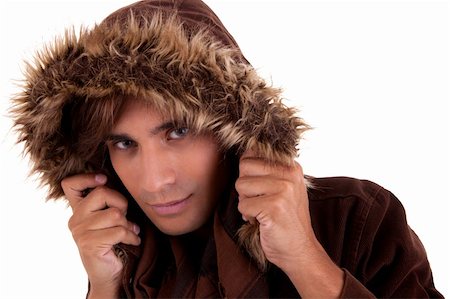 peeping fashion - Portrait of a young man with a furry hood , in autumn/winter clothes, isolated on white. Studio shot Stock Photo - Budget Royalty-Free & Subscription, Code: 400-04717725