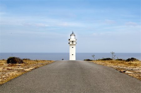 simsearch:872-06053881,k - Barbaria lighthouse Formentera from road perspective Balearic Islands Stock Photo - Budget Royalty-Free & Subscription, Code: 400-04718072