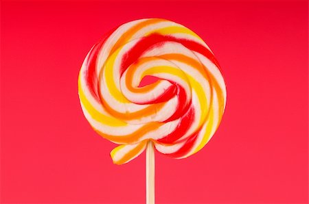 simsearch:400-05918018,k - Colourful lollipop against the colourful background Photographie de stock - Aubaine LD & Abonnement, Code: 400-04718615