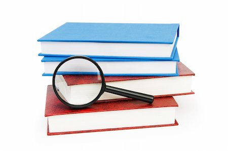 simsearch:400-05734056,k - Magnifying glass over the stack of books Photographie de stock - Aubaine LD & Abonnement, Code: 400-04718653