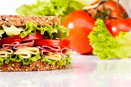 Salami sandwich with cheese lettuce and tomato Stock Photo - Budget Royalty-Free & Subscription, Code: 400-04718827