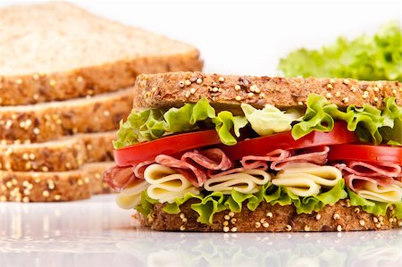 Salami sandwich with cheese lettuce and tomato Stock Photo - Budget Royalty-Free & Subscription, Code: 400-04718829