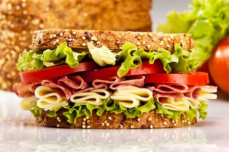 Salami sandwich with cheese lettuce and tomato Stock Photo - Budget Royalty-Free & Subscription, Code: 400-04718831
