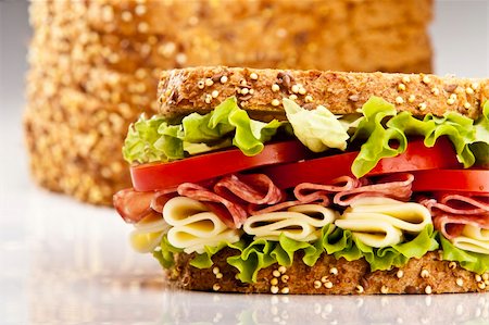 Salami sandwich with cheese lettuce and tomato Stock Photo - Budget Royalty-Free & Subscription, Code: 400-04718832