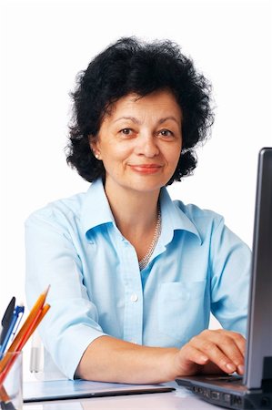 simsearch:400-04121486,k - Elder woman using laptop on white background. Foto de stock - Super Valor sin royalties y Suscripción, Código: 400-04719001