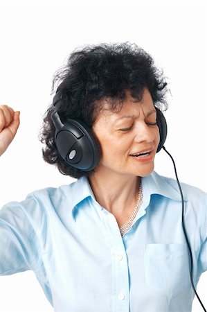 elderly person singing - Active happy senior woman enjoying music over white background. Stock Photo - Budget Royalty-Free & Subscription, Code: 400-04719021