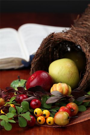 Thanksgiving arrangement with cornucopia and the Bible in background Stock Photo - Budget Royalty-Free & Subscription, Code: 400-04719777