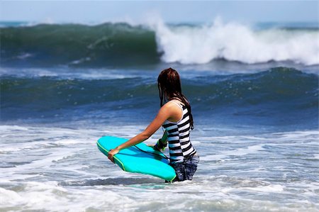 simsearch:400-07212763,k - Gilr - the surfer in ocean. Bali. Indonesia Photographie de stock - Aubaine LD & Abonnement, Code: 400-04710062