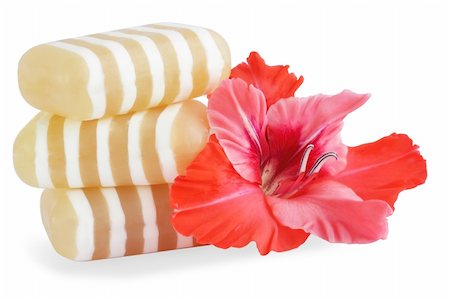 Glycerin soap with the flower of the gladiolus Foto de stock - Royalty-Free Super Valor e Assinatura, Número: 400-04711100