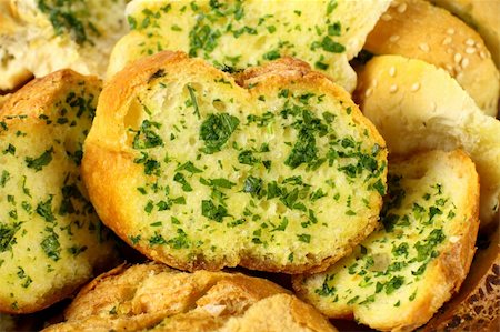 simsearch:400-05255035,k - Delicious homemade herb and garlic crusty bread ready to serve. Stock Photo - Budget Royalty-Free & Subscription, Code: 400-04711403