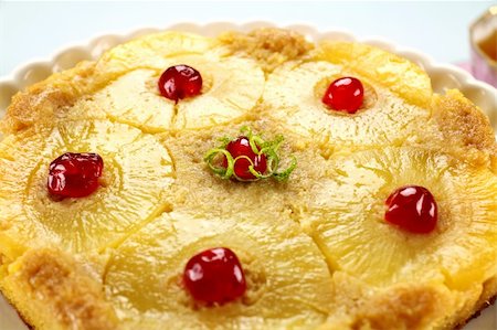 pineapple cake - Fresh baked pineapple upside down cake with glace cherries. Stock Photo - Budget Royalty-Free & Subscription, Code: 400-04711422