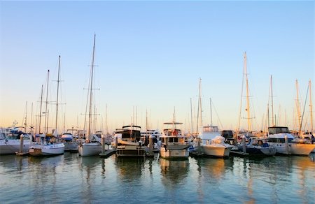 simsearch:400-05255037,k - Yachts and boats at berth in a marina in the setting sun. Stock Photo - Budget Royalty-Free & Subscription, Code: 400-04711435