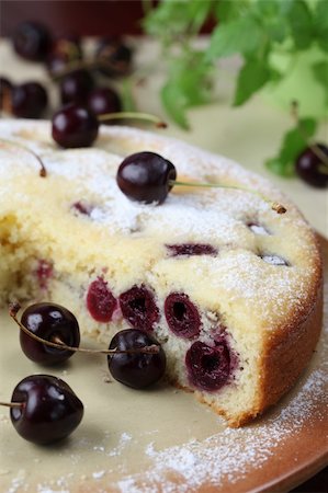 simsearch:400-04709493,k - Delicious homemade sponge cake with black cherries. Shallow DOF Stock Photo - Budget Royalty-Free & Subscription, Code: 400-04711520